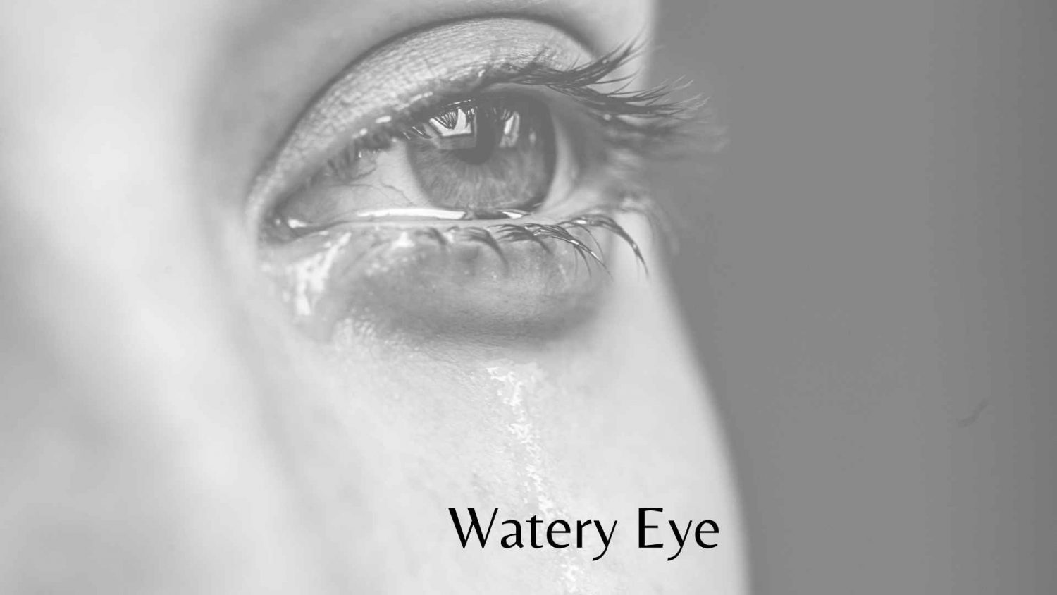 Watery eye. water streaming down the face from the eye